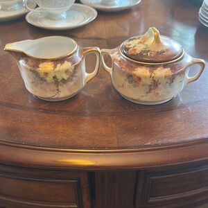 KPM cream and sugar, brown, and yellow floral